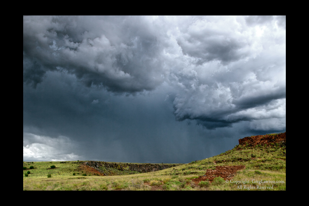 Ruins under dramatic sky on the Colorado River Plateau, Greg Lawson Galleries in Sedona, Arizona